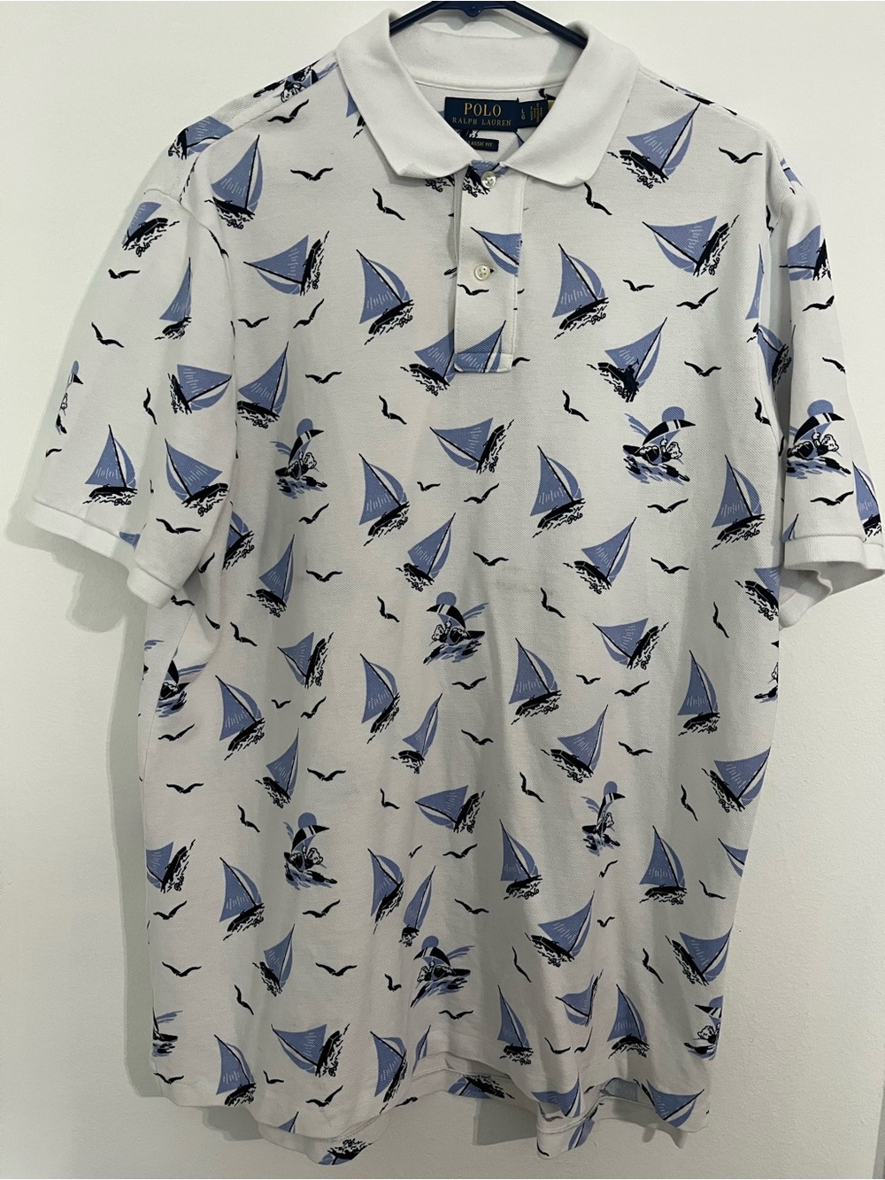 Ralph Lauren White Polo Shirt with Light Blue Sailboat Print